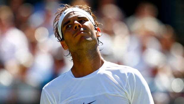 nadal-loses-wimbledon-lead.jpg